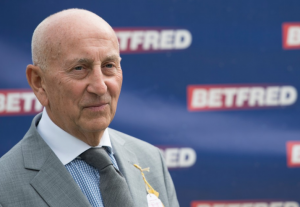 Fred Done Receives Over £10 Million Dividend Amidst Betfred Lay-Offs and Shop Closures
